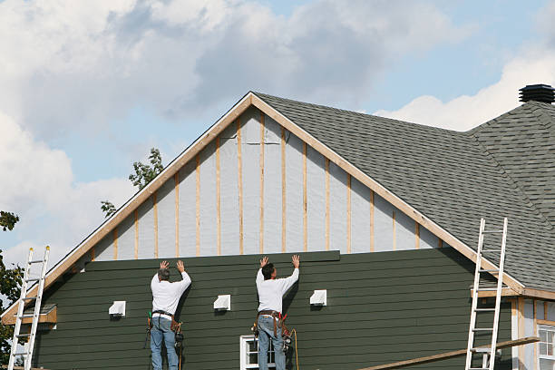 Professional Siding Repair technician working in Partlow, VA